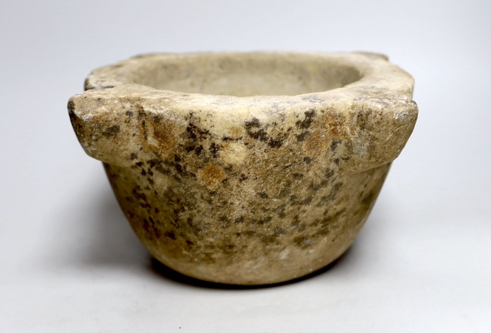 A 17th/18th century carved marble mortar, 31cm